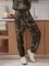 Black Holiday Paneled Cotton-Blend Ombre/tie-Dye Pants