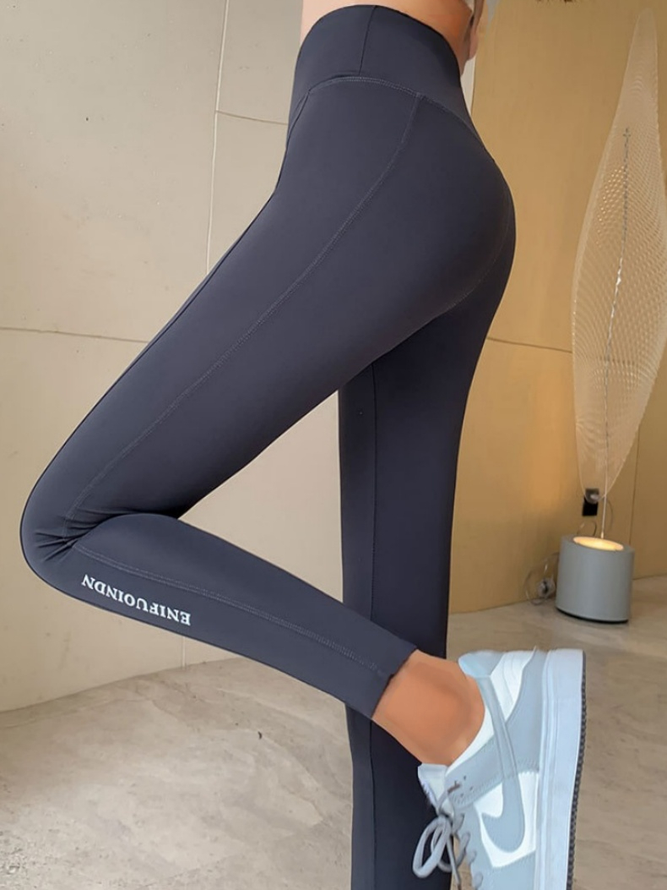 Side view of Women Plain Casual Long Slim Fit Pants All Season Leggings
